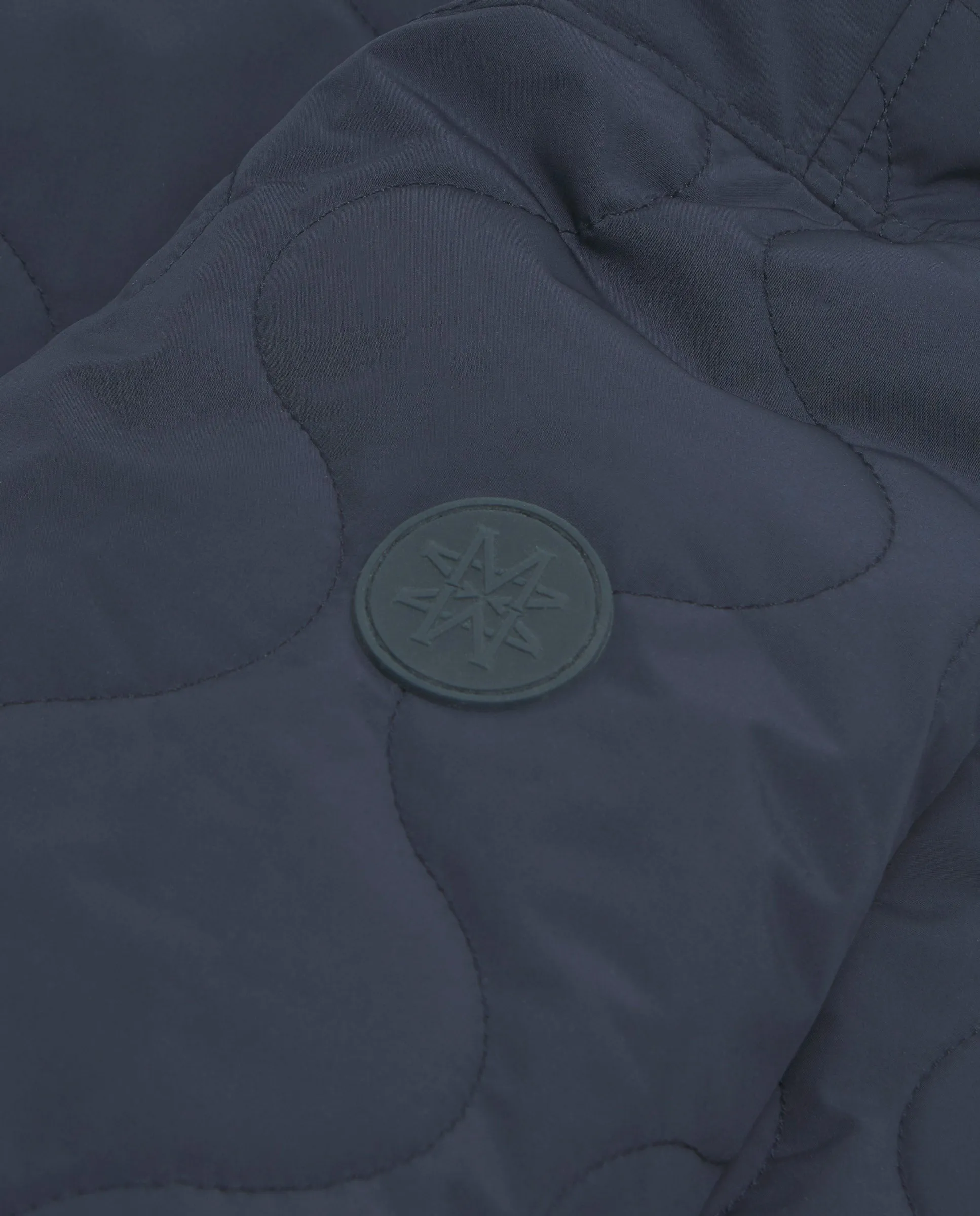 Parka corta acolchada azul marino